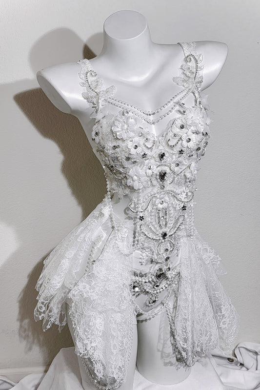 Crystalaisy handmade white rave set with rhinestone bra, lace skirt, and pearl details